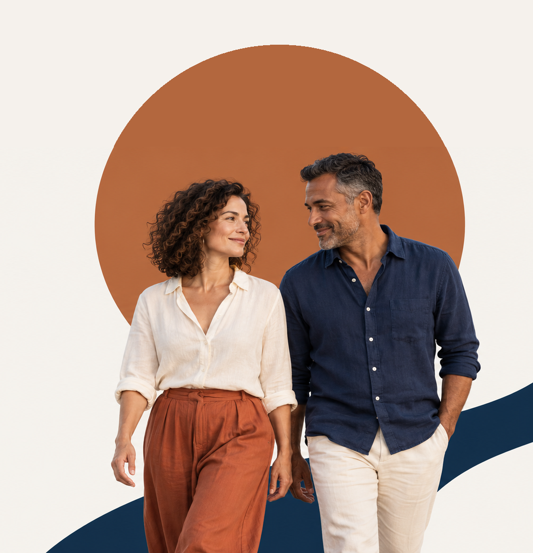 A smiling couple walking in front of a terracotta sun and navy wave, HealthBuy brand illustration